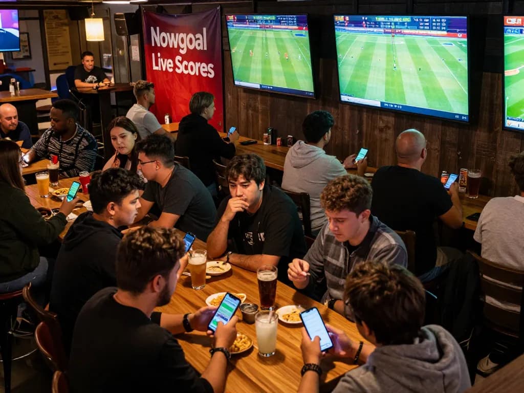 Patrons engaging in sports betting excitement with Nowgoal live scores displayed on screens.